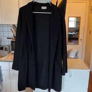 Long soft open sweater cardigan with pockets and collar, great for travel